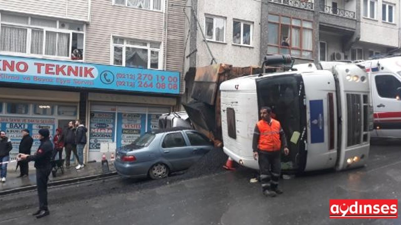 Gaziosmanpaşa'da asfalt yüklü kamyon otomobilin üzerine devrildi